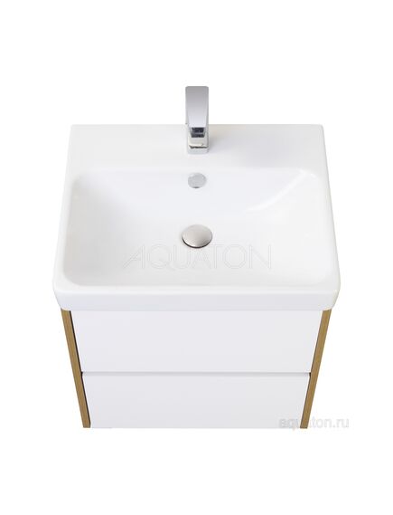 Купить Тумба под раковину AQUATON Сканди 70 белая, дуб рустикальный 1A251801SDZ90 (1a251801sdz90) по цене 9967.5 руб., в Санкт-Петебруге в интернет магазине 100-Систем, а также дургие товары AQUATON из раздела Тумбы под раковину и Мебель для ванной комнаты