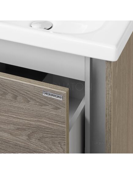 Купить Тумба под раковину AQUATON Стоун 60 сосна арлингтон 1A231401SX850 (1a231401sx850) по цене 15851.7 руб., в Санкт-Петебруге в интернет магазине 100-Систем, а также дургие товары AQUATON из раздела Тумбы под раковину и Мебель для ванной комнаты